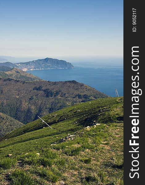 Beautiful view from the hills around Genoa. On the background the famous mounth of Portofino Italy. Beautiful view from the hills around Genoa. On the background the famous mounth of Portofino Italy