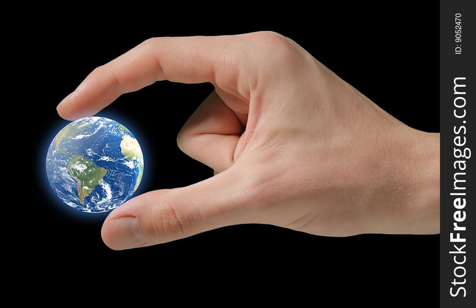 Small glowing Earth in human hand. Small glowing Earth in human hand.