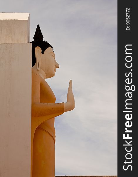 Standing Buddha image in Wat Yai, Pitsanulok province, Thailand