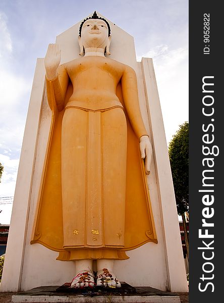 Standing Buddha image in Wat Yai, Pitsanulok province, Thailand