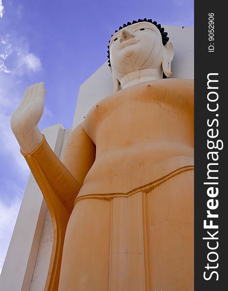 Standing Buddha image in Wat Yai, Pitsanulok province, Thailand