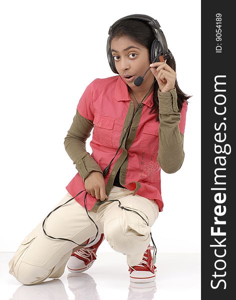 Young beautiful girl listening music in headphone. Young beautiful girl listening music in headphone
