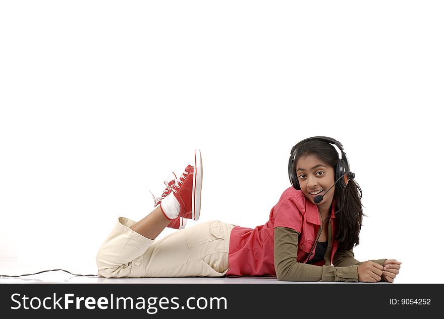 Young beautiful girl listening music in headphone. Young beautiful girl listening music in headphone