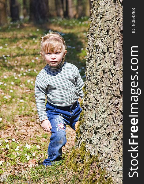 Beautiful smiling baby on the nature