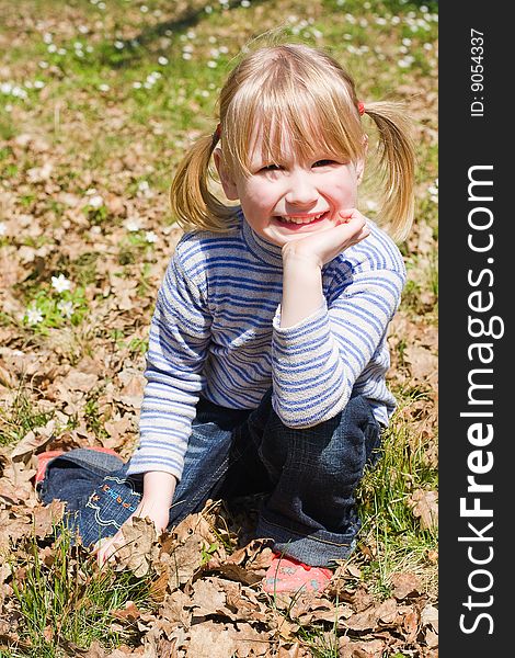 Beautiful smiling baby on the nature