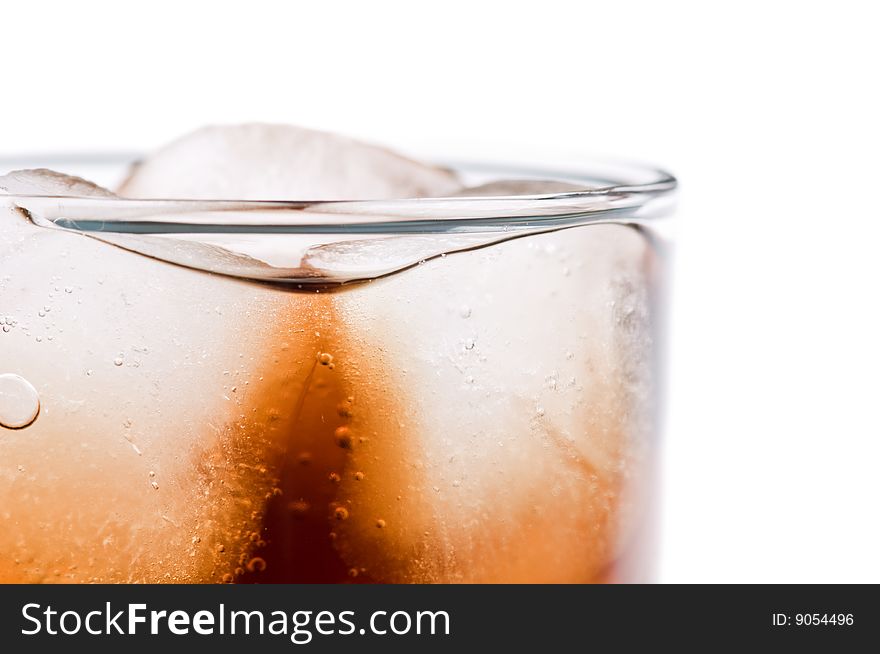 Glass of cola isolated on the white background