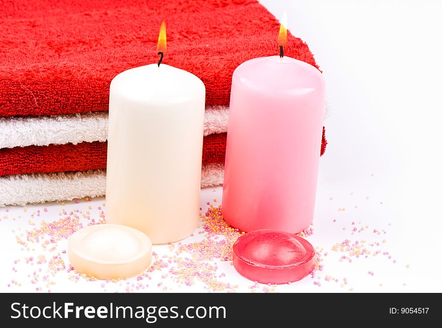 Towels and candles with soap