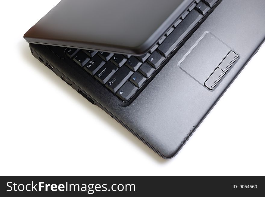 Black stylish laptop. Isolated on white. Black stylish laptop. Isolated on white.