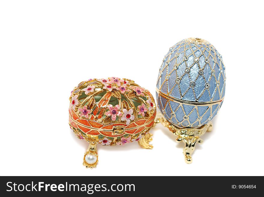Two Beautiful Easter egg in the box for jewelery and cherry blossom isolated on white/ That is great present. Two Beautiful Easter egg in the box for jewelery and cherry blossom isolated on white/ That is great present.