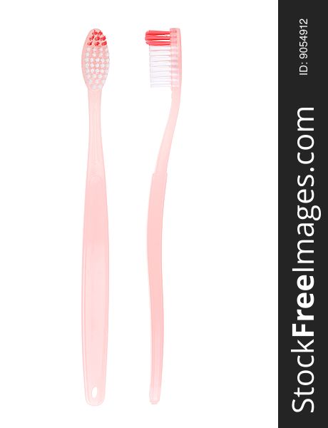 Colored toothbrush in glass. With clipping path.