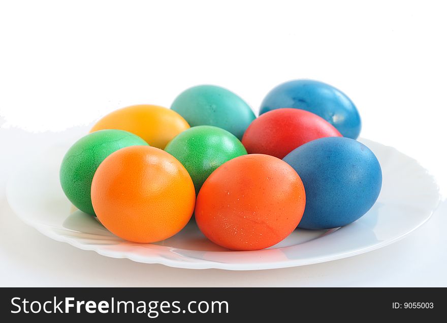 Painted eggs on the plate