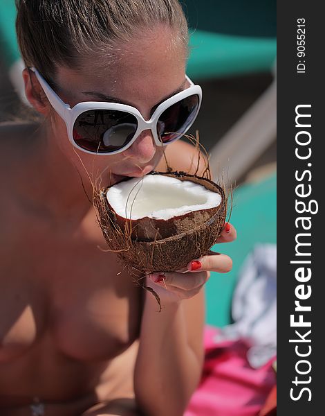 Woman Drinking Coconut Milk