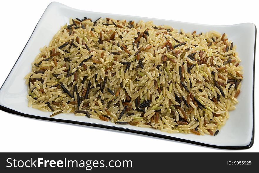 Closeup of long rice mixed with wild rice isolated on white
