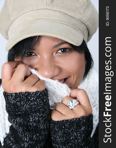 Beautiful young woman dressed in winter clothing. Beautiful young woman dressed in winter clothing