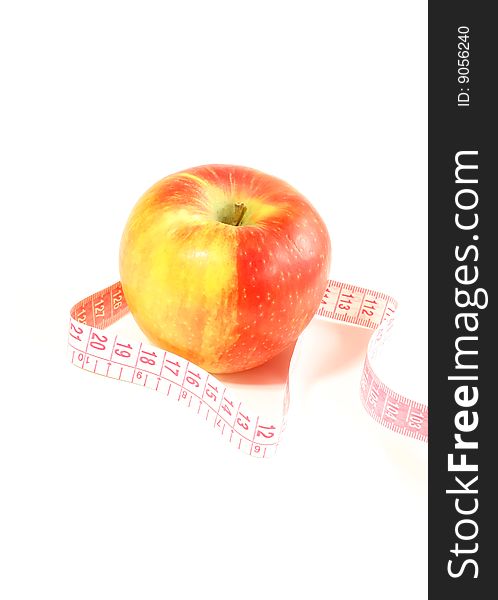 Apple And Measuring Tape Isolated On White Backgro