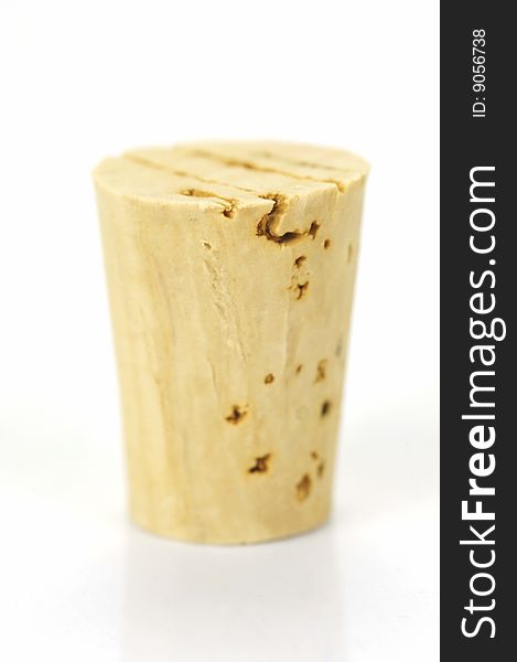 Cork stopper isolated against a white background. Cork stopper isolated against a white background