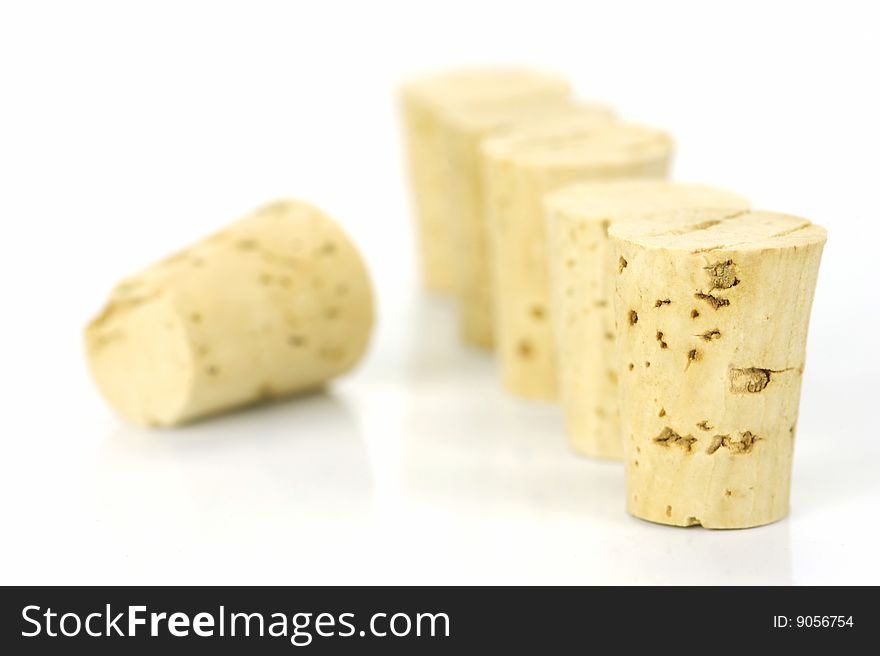 Cork stopper isolated against a white background. Cork stopper isolated against a white background