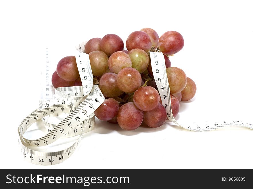 Juicy black grapes on a white background. Juicy black grapes on a white background
