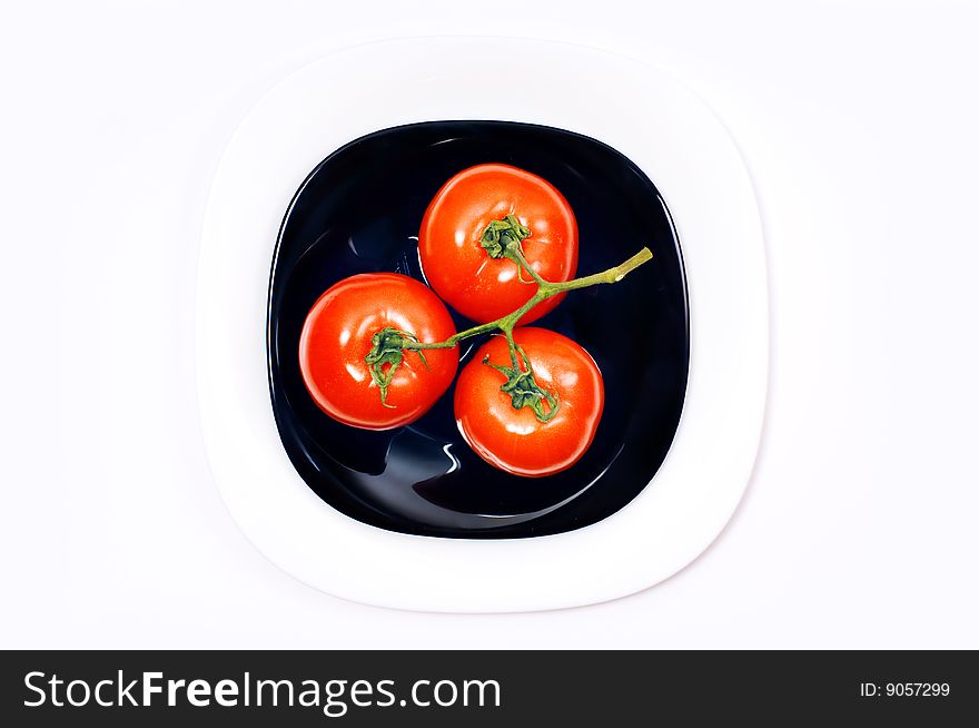 Bunch Of Tomato On Plates
