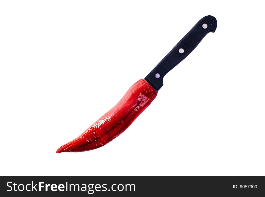 Red hot pepper knife on white with clipping path