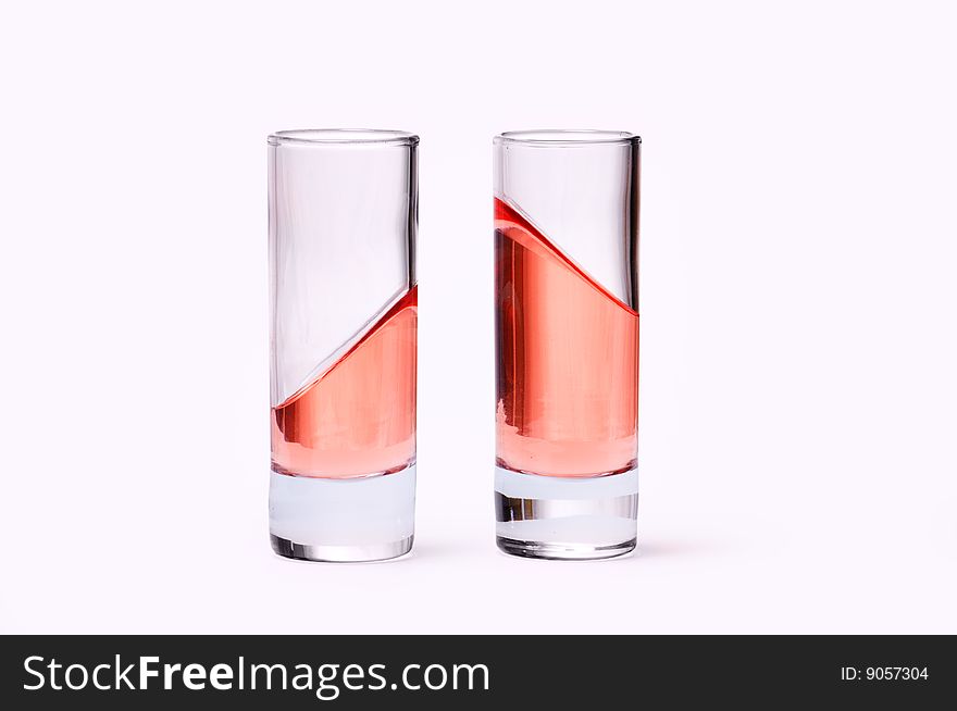 Thin Glasses With Pink Liquid