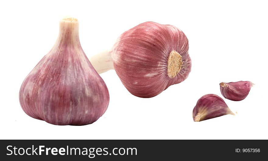 Garlic bulbs and cloves isolated on whie background