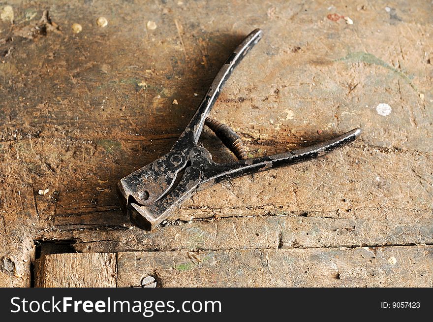 Old carpenter tool on wooden table