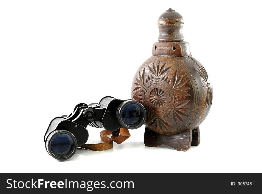 Vintage travel tools, binocular and wooden bottle. Vintage travel tools, binocular and wooden bottle