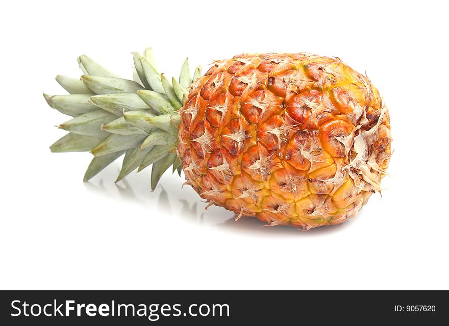 Ripe sweet pineapple isolated on white background