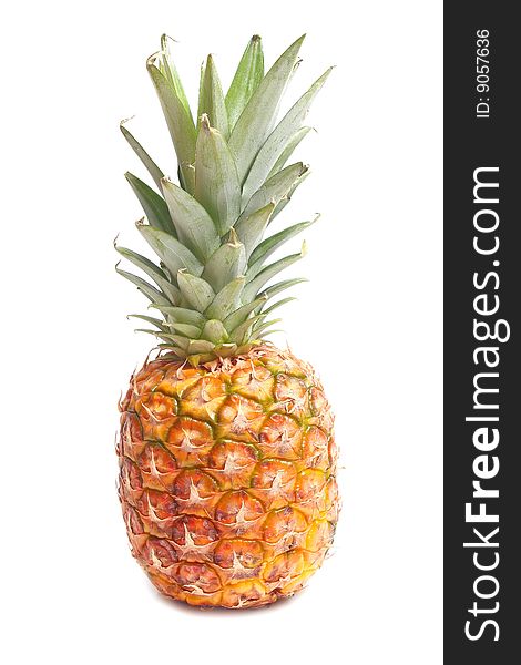 Ripe sweet pineapple isolated on white background