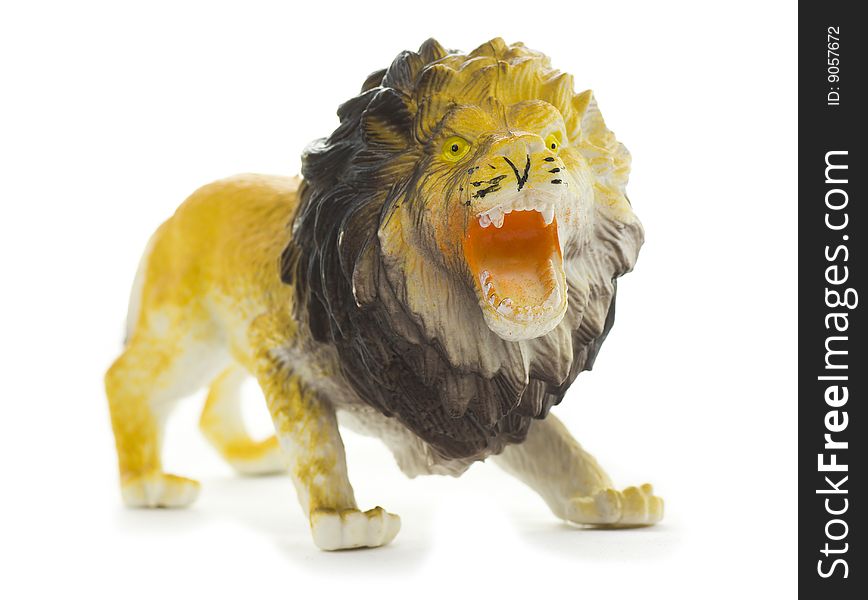 Lion figure toy isolated on white background; without trademark