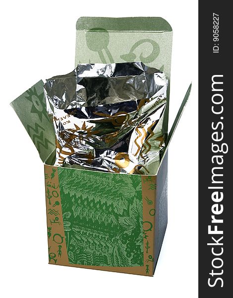 Open pack from a green cardboard with packing from a foil. Open pack from a green cardboard with packing from a foil