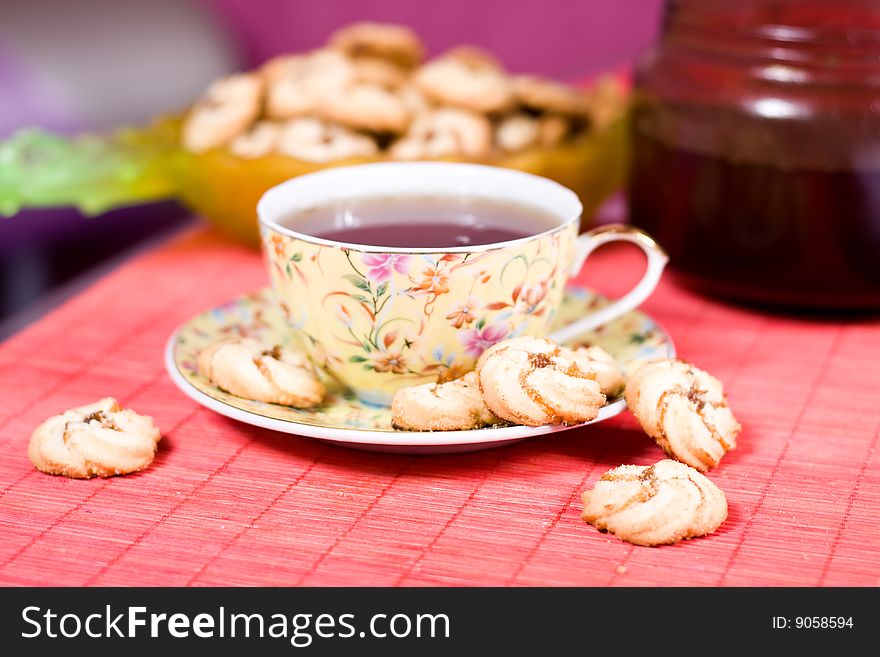 Cup of hot tea with cookies at home. Cup of hot tea with cookies at home