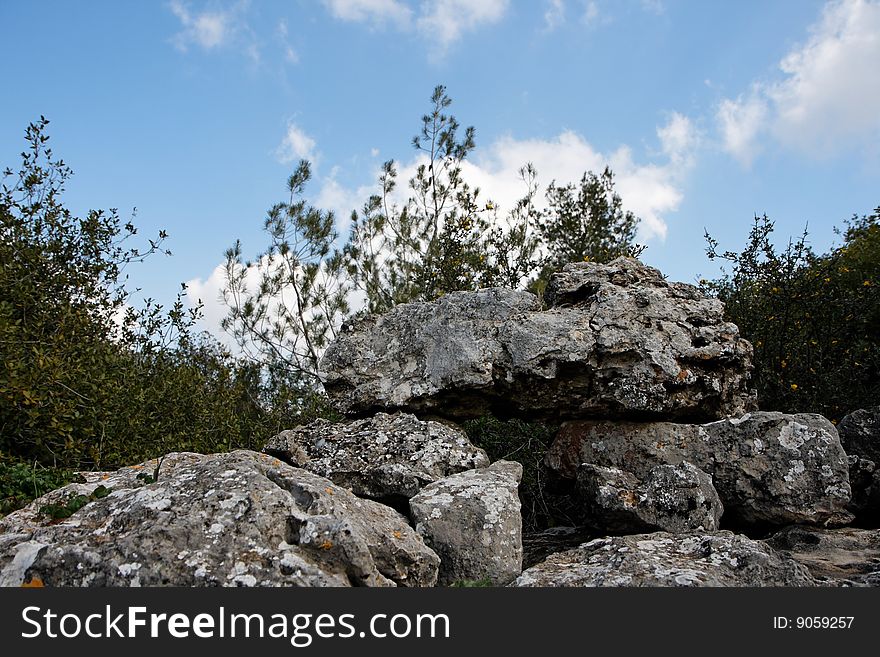 Pyramid Of Lichen-covered Gray Rocks