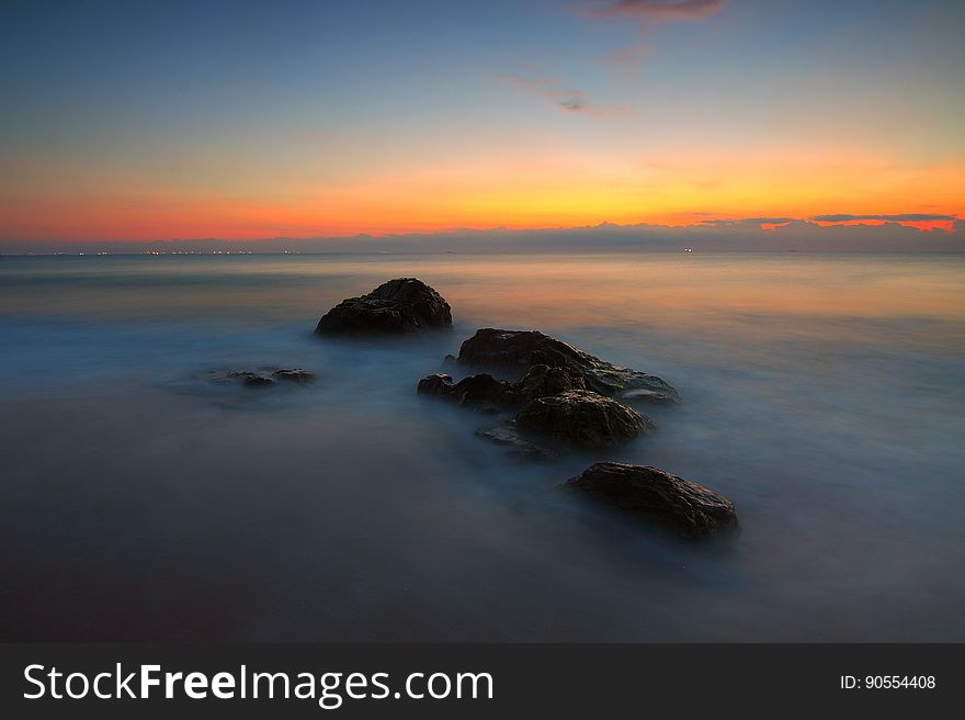 A long exposure of sea with sunrise. A long exposure of sea with sunrise.
