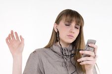 Female Model With Cellphone And Headphones Stock Photos Female Model With Cellphone And Headphones Stock Photos