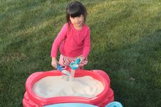 Asian Girl Playing In A Sand Table Royalty Free Stock Image Asian Girl Playing In A Sand Table Royalty Free Stock Image
