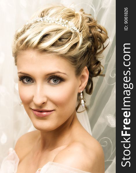 Beautiful Blond bride wearing diamond jewelery and tiara. Beautiful Blond bride wearing diamond jewelery and tiara