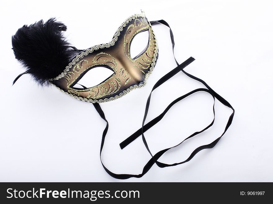 Elegant mask on white bakground with ribbons. Elegant mask on white bakground with ribbons