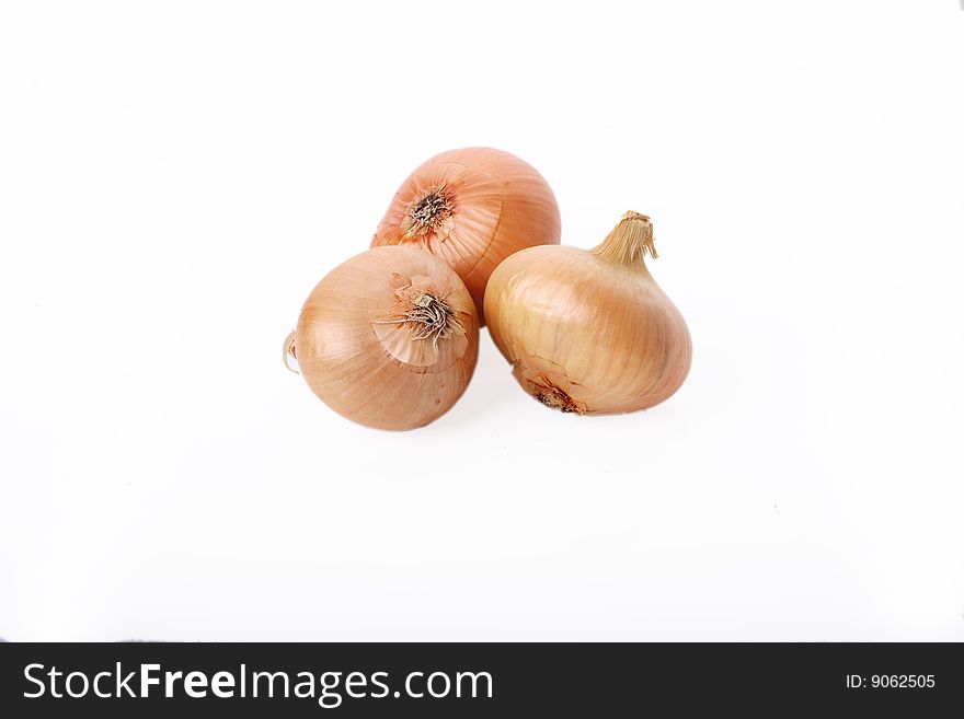 Group of three onoins on white background. Group of three onoins on white background