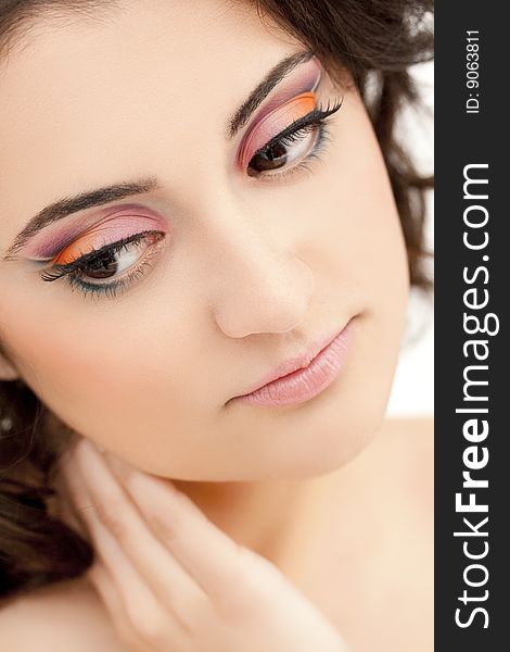 Closeup portrait of beautiful woman with colorful makeup. Closeup portrait of beautiful woman with colorful makeup