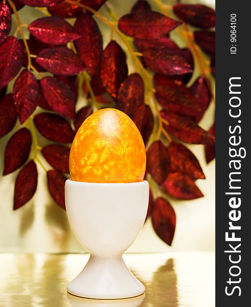 Easter egg with red leaves. Easter egg with red leaves