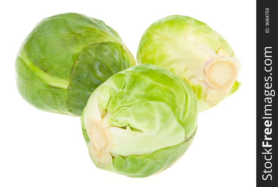Three brussels sprouts, isolated on white. Three brussels sprouts, isolated on white