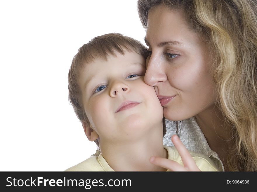 Portrait of a family. Mother kissing her son. Portrait of a family. Mother kissing her son.