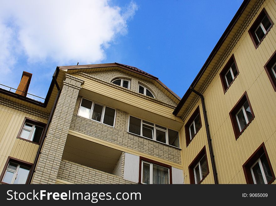 Modern building from a brick. Colour house.