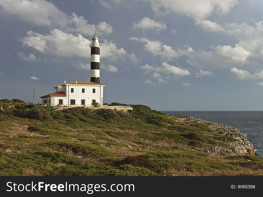 Punta de ses Crestes Lighthouse in Majorca (Balearic Islands - Spain). Punta de ses Crestes Lighthouse in Majorca (Balearic Islands - Spain)