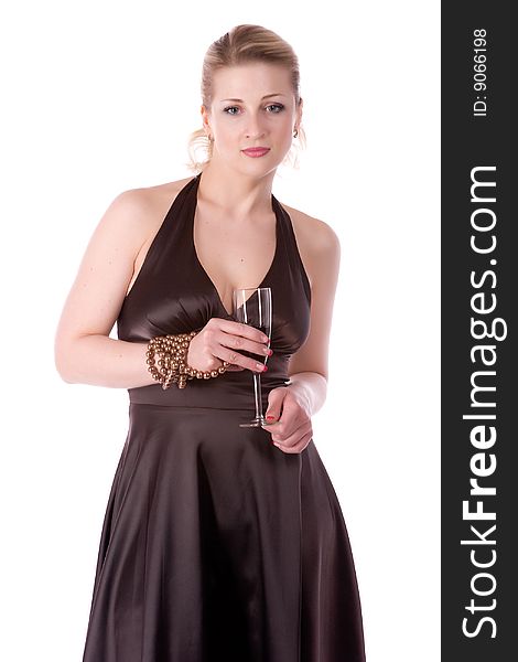 Woman in brown dress with a glass of wine on a white background. Woman in brown dress with a glass of wine on a white background