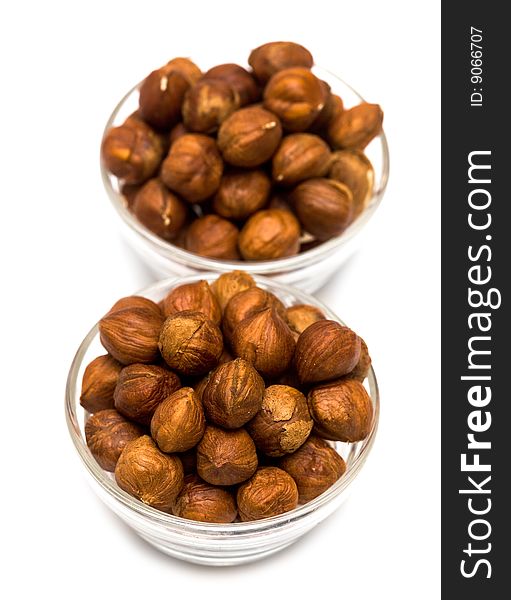 Many Hazelnuts In Glass