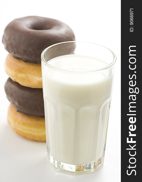 Breakfast glass of chocolate milk and donut