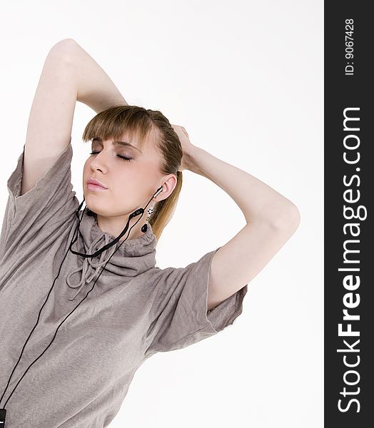 Pretty female model with headphones